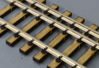 three rail track, wooden ties 0/0m